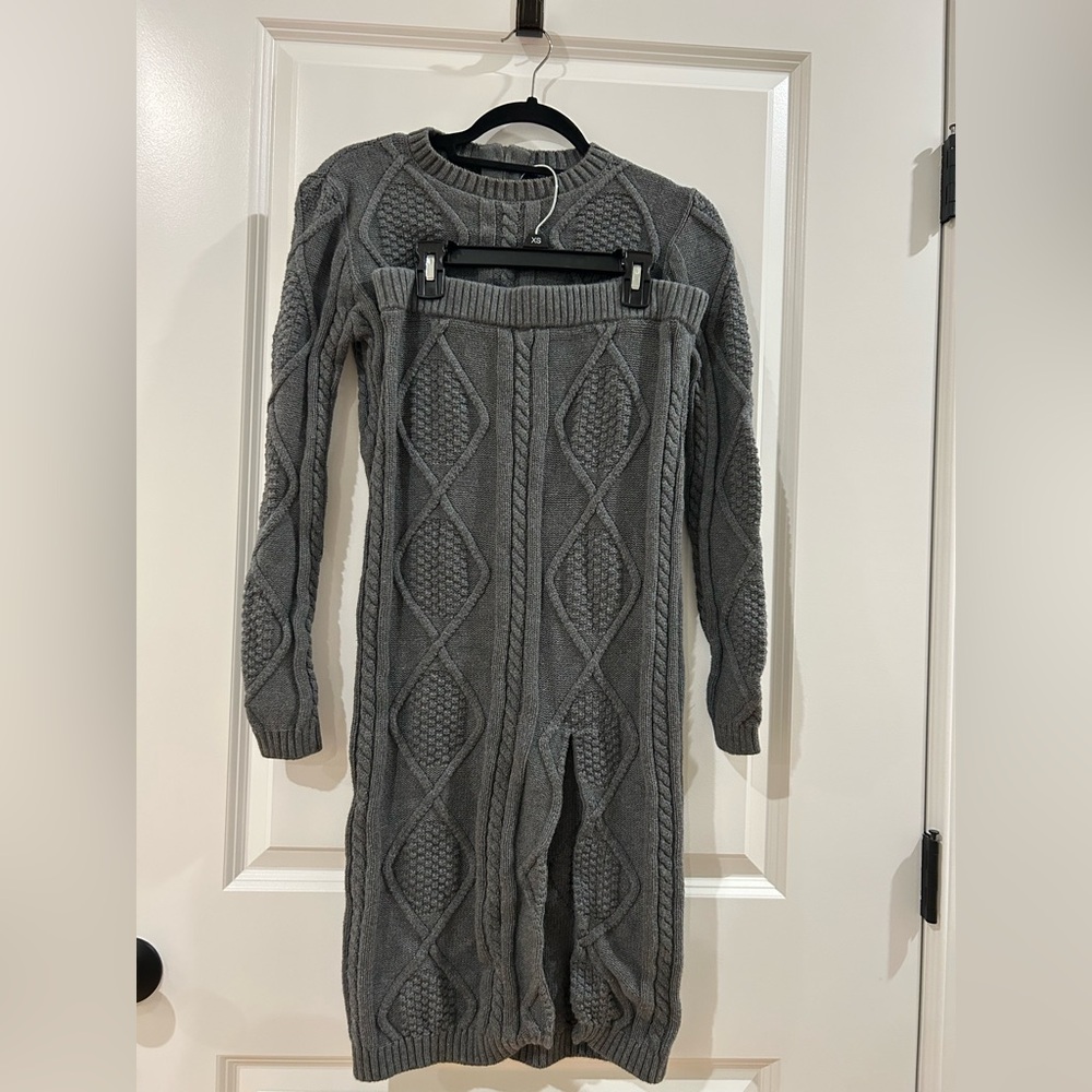 By Egreis charcoal gray cable knit sweater and skirt set. Top is XS,bottom is S